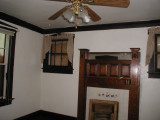 Living Room With Fireplace and Oak Mantle