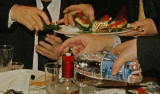 Six Hands At Russian Banquet Table