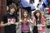 market kids eating toffee