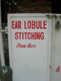 Ear Lobule Stitching Done Here