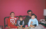 In bed with sons Christopher and Landrum and daughter Gillian, Larchmont, NY c. 1968