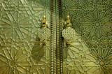 the exquisitely engraved bronze doors are fitted with fine bronze knockers