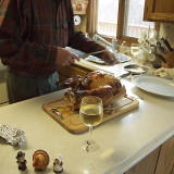 attempting to carve the Turkey