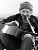 Greg Esai singing at Venice Beach