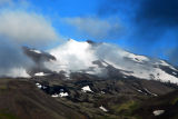 Snfellsjkull peaking through the clouds at the end of Snfellsnes Peninsula