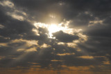 The sun breaking through clouds, Al Sawadi Beach