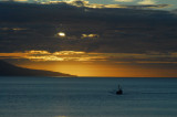 Ship headed for port at sunset, Hsavk