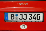 Berlin license plate on a Smart car