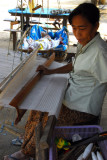 Lao woman weaving cloth at Ban Xang Hai