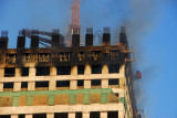 The fire was limited to the top 3 floors of the building
