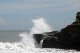 Heavy surf crashing against the cliffs at Tanah Lot, Bali