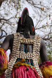 Cowrie shells on the back of a stilt dancers costume