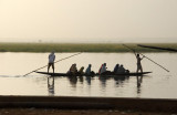 Pirogue ferrying people across the Niger River, Gao