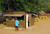 Roadside tin stall with American flag, Benin