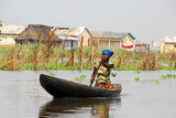 Ganvi woman paddling - no smile, no greeting