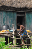 Woman climbing down from her hut