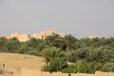 The Sanctuary of Bel rising behind the Palmyra Oasis, Syria