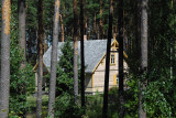 1925 living house from Kazaki seen through the trees