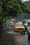 Taxi on flooded road