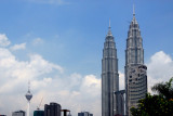 Petronas Towers with Menara Kuala Lumpur in the background