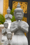 Kneeling statues, Mondapa of Satra and Tripitaka