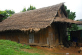 Thatched house in a Thai hill village, Doi Angkhang