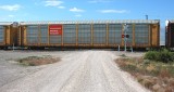 Westbound train of auto racks at Lucin, Utah