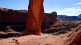 Swinging upside down at Corona Arch