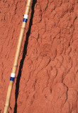 Texture of the column of soil that holds up the boulders