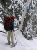 Sheila pondering the sign