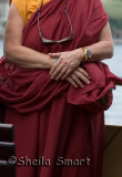 Monk with hands crossed