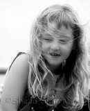 Little girl on ferry in black and white