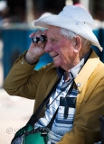 Elderly man with telescope 