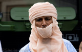 Man in arab dress at Bastille Day parade