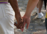 A couple holding hands