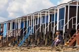 Beach huts with people. Southend, Essex