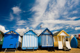 Four beach huts at Southend