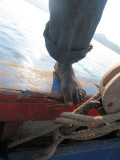 the captains feet on the boat