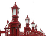 Lampposts on a fence near the Auckland harbor