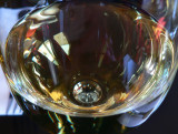 Reflection of the window in a wine glass