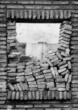 November 16 - Stacked Bricks In Window