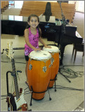 Iliana Beating the Congas at Abiding Savior