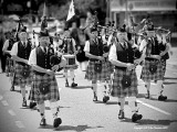 The Pipes & Drums Lead the way 