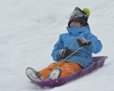 Colten sliding with his sister