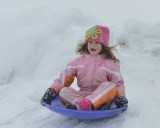 Jordan sliding with her brother