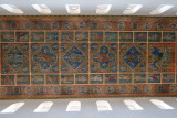 The painted wooden ceiling