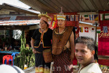 Village elders and import people greet the procession from their homes