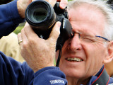 Canon-Man while photographing Buddha