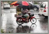 74 Under heavy rain in Saigon