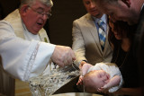 In her Christening Gown